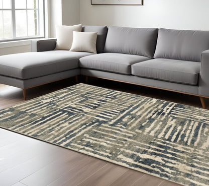 Blue and beige abstract shag area rug, 7' x 9'.