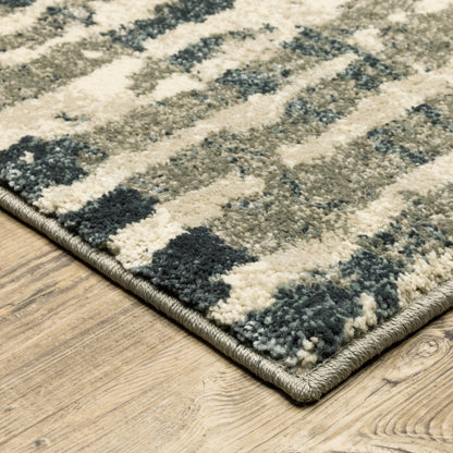 7' X 9' Blue And Beige Abstract Shag Area Rug