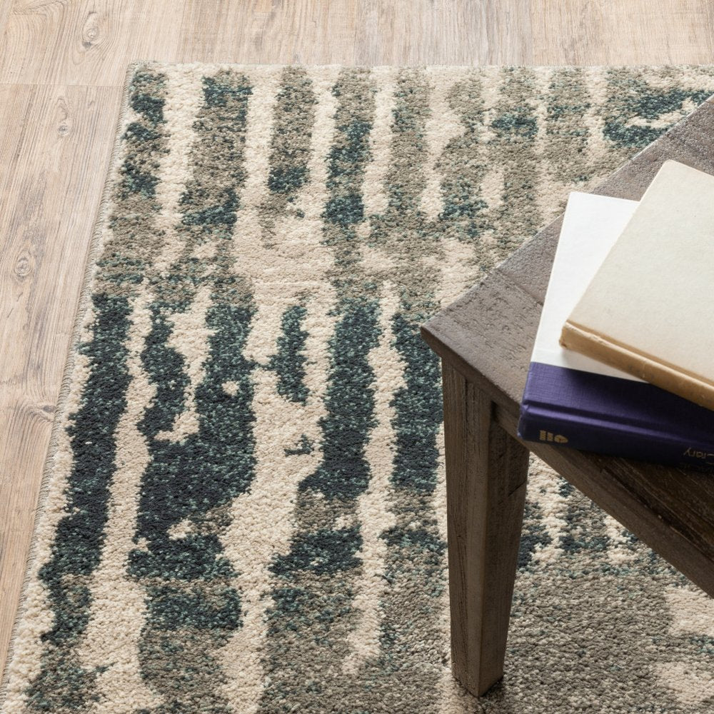 7' X 9' Blue And Beige Abstract Shag Area Rug