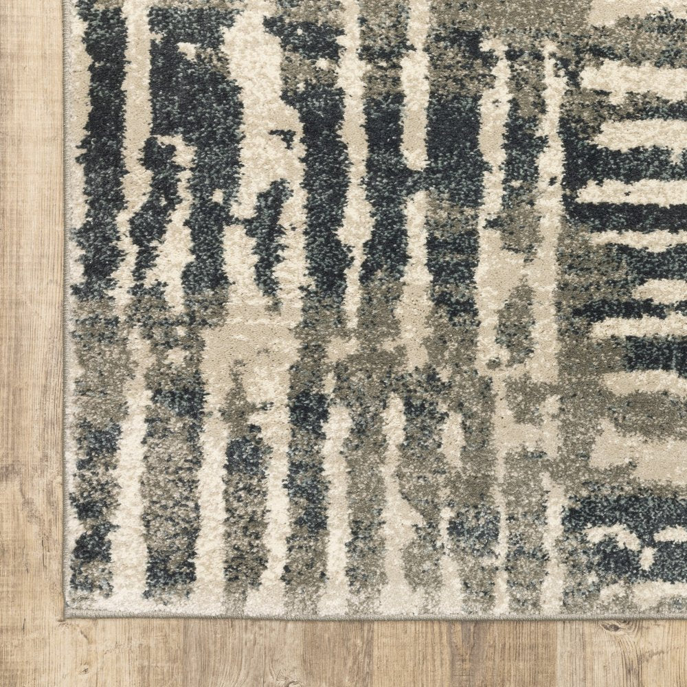 7' X 9' Blue And Beige Abstract Shag Area Rug