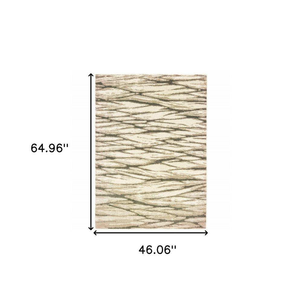 Rectangular ivory sand and ash abstract area rug with woven texture; 64.96 by 46.06 inches.