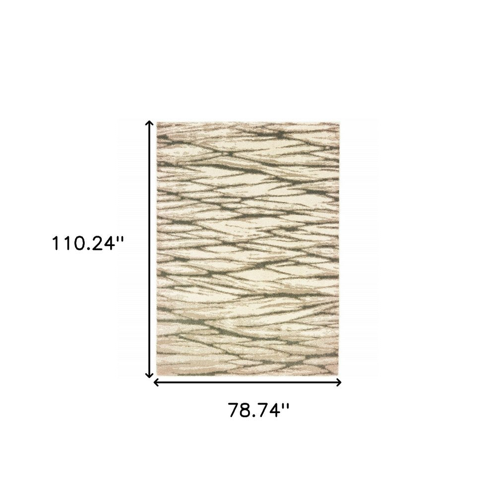 7' X 9' Ivory And Sand Abstract Shag Area Rug