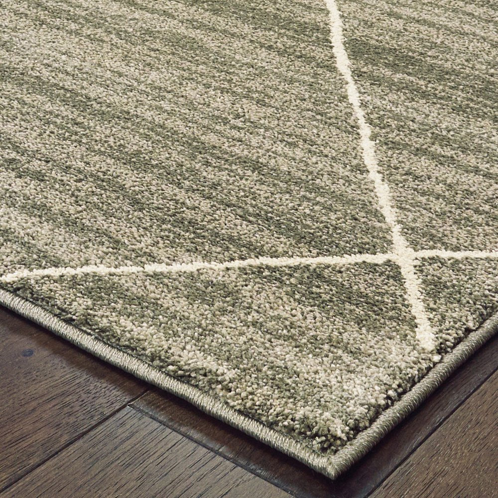 7' X 9' Gray And Ivory Geometric Shag Area Rug
