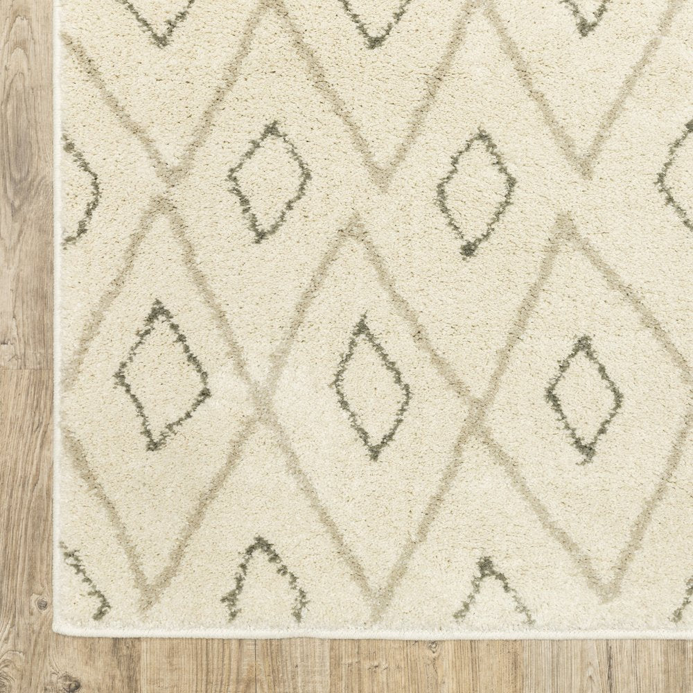 Beige runner rug with a soft gray diamond lattice pattern on a light wood floor.