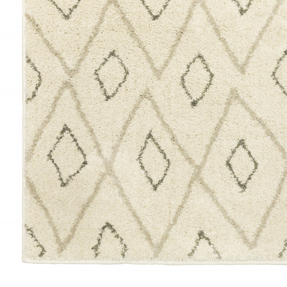 Cream rug with subtle gray diamond lattice pattern, soft plush pile and geometric boho style.