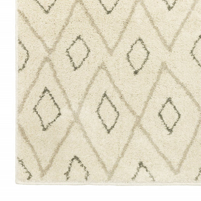 Cream rug with subtle gray diamond lattice pattern, soft plush pile and geometric boho style.