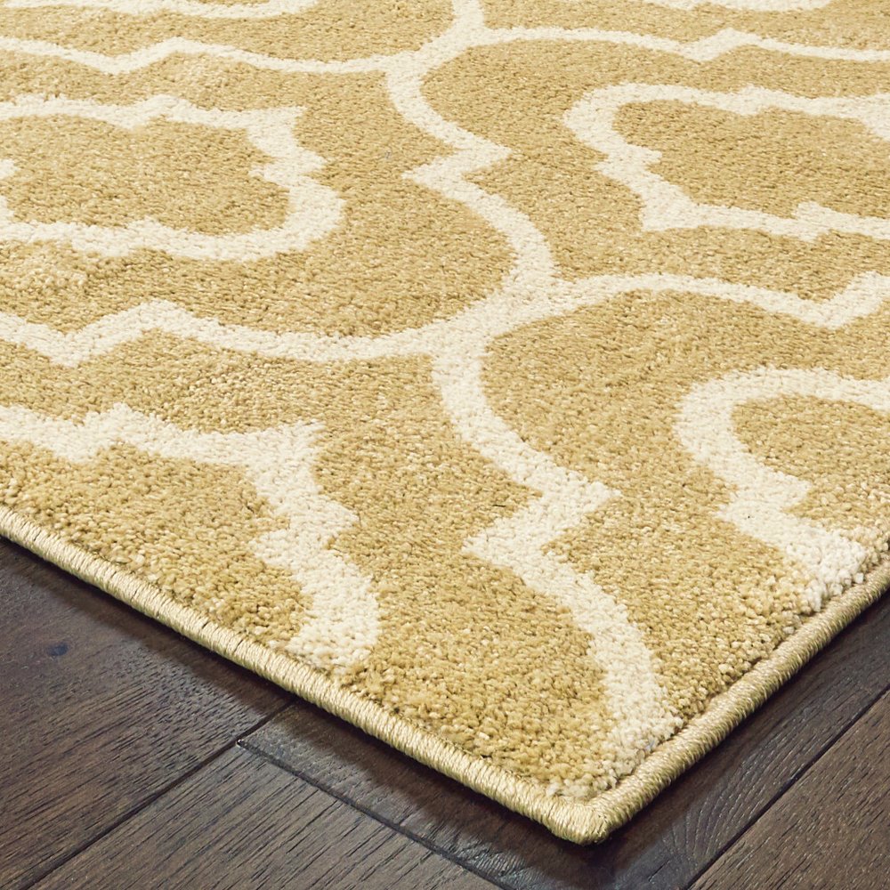 7' X 9' Gold And Ivory Geometric Shag Area Rug