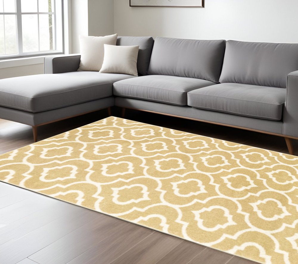 7' X 9' Gold And Ivory Geometric Shag Area Rug