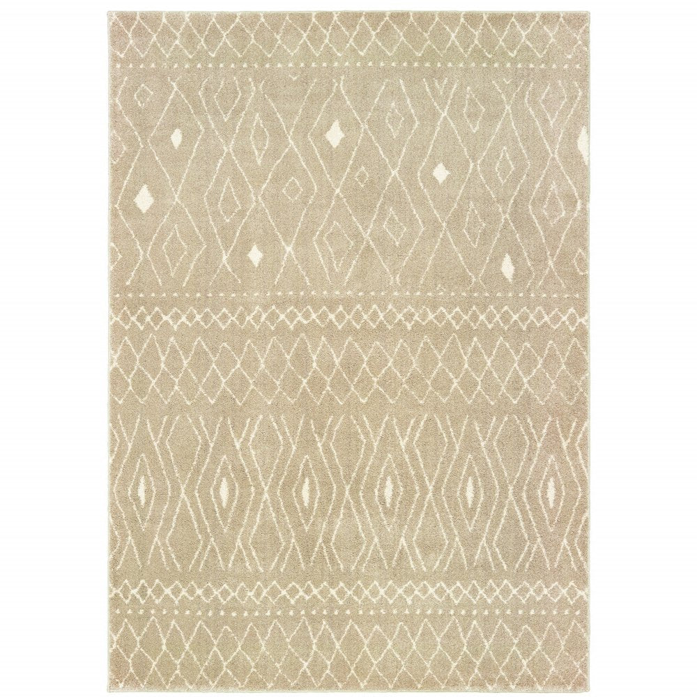 Sand geometric shag area rug with cream diamond motifs and layered bands; soft textured pile.