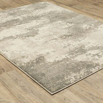 10' X 13' Beige And Grey Abstract Power Loom Stain Resistant Area Rug