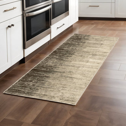 2' X 8' Beige And Grey Abstract Power Loom Stain Resistant Runner Rug