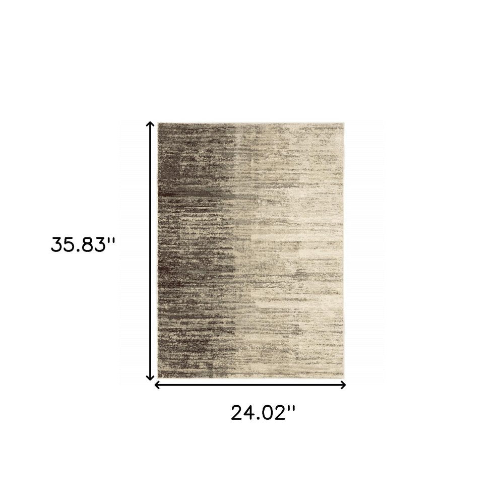 2' x 3' beige and grey abstract power loom stain-resistant area rug.