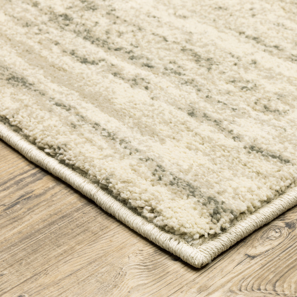 2' X 3' Beige And Grey Abstract Power Loom Stain Resistant Area Rug