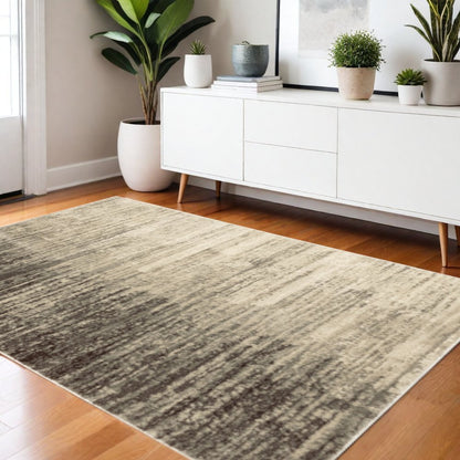4' X 6' Beige And Grey Abstract Power Loom Stain Resistant Area Rug