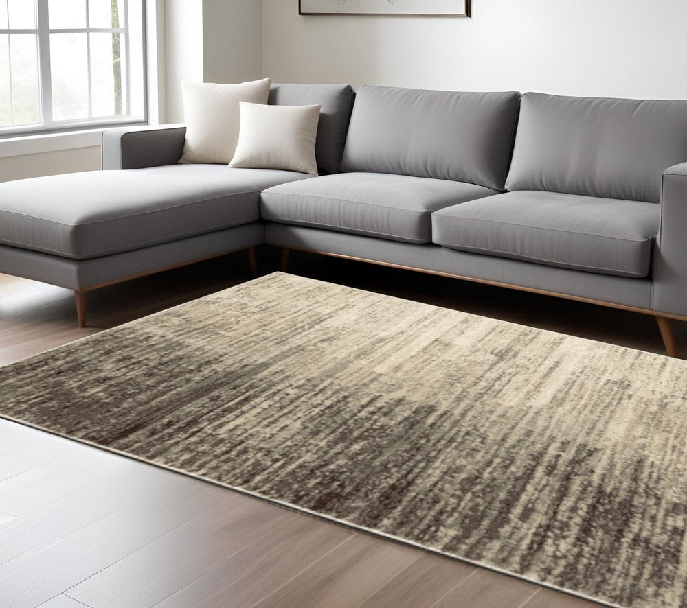 7' X 9' Beige And Ivory Abstract Shag Area Rug