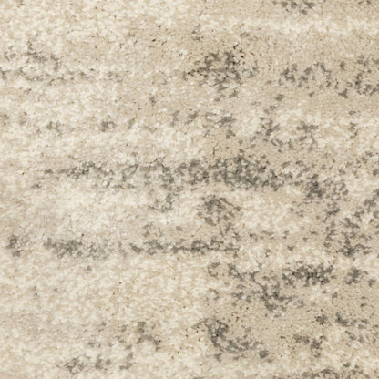 7' X 9' Beige And Ivory Abstract Shag Area Rug