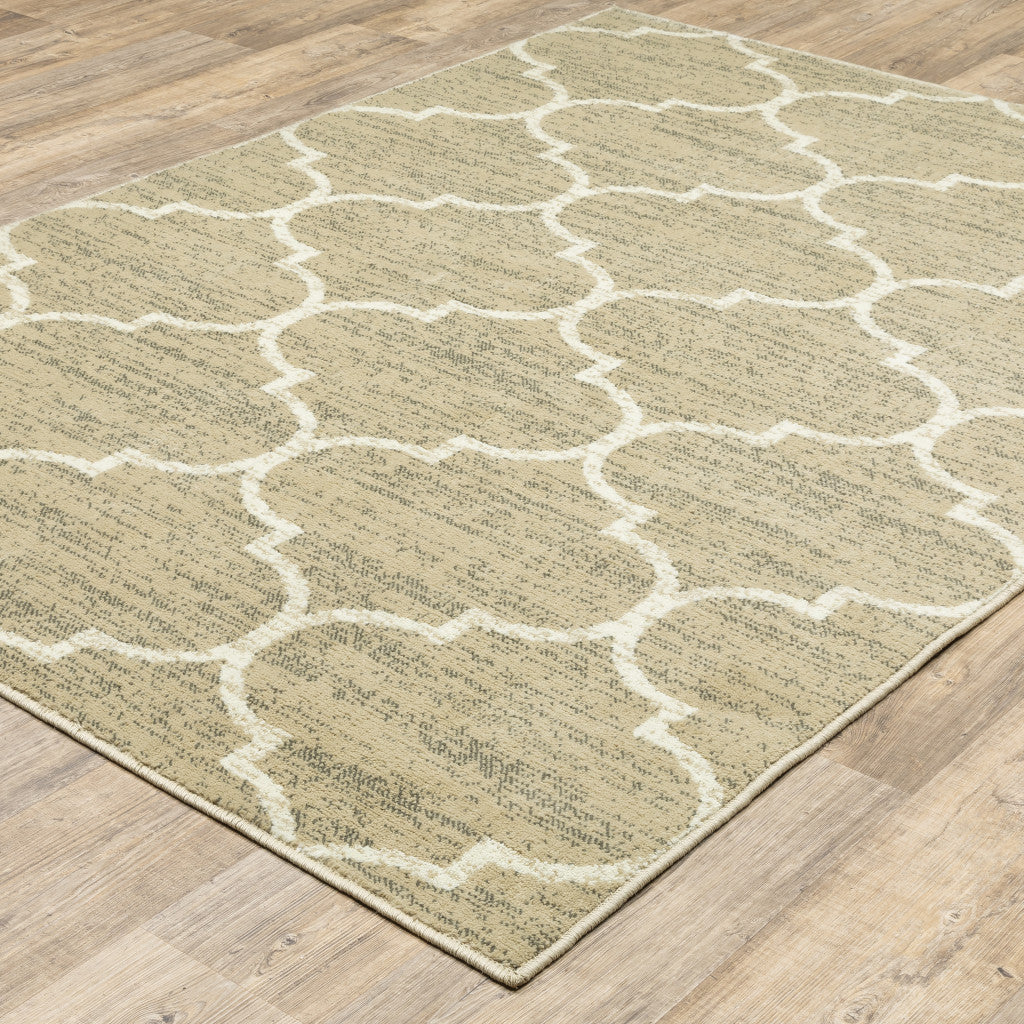 6' X 9' Beige And Ivory Geometric Power Loom Stain Resistant Area Rug