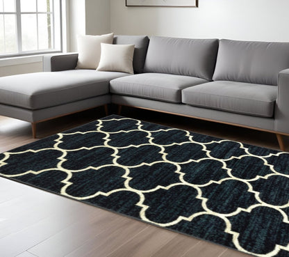 10' X 13' Navy And Ivory Geometric Power Loom Stain Resistant Area Rug