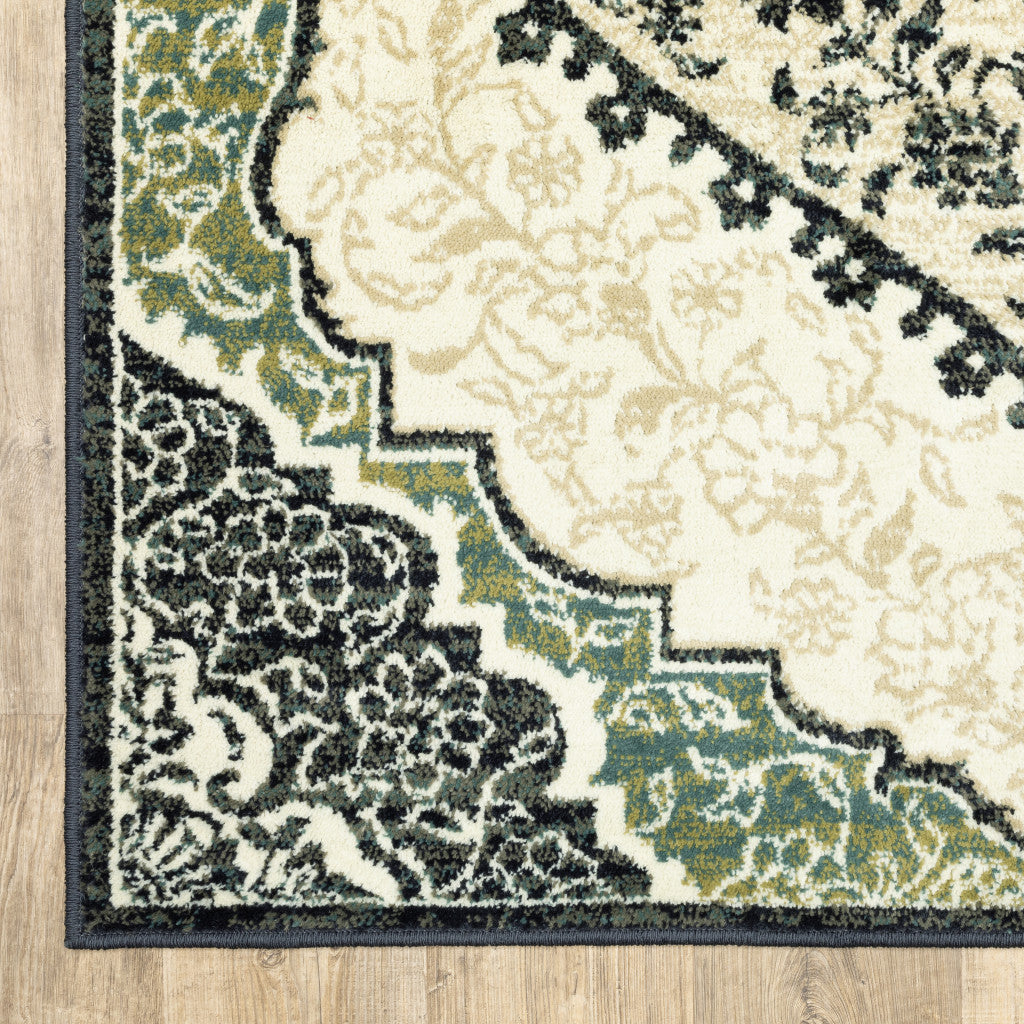 6' X 9' Ivory Navy And Green Oriental Power Loom Stain Resistant Area Rug