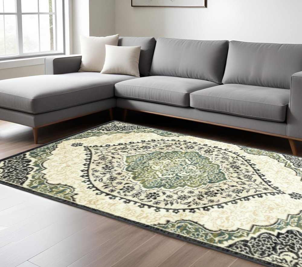 10' X 13' Ivory Navy And Green Oriental Power Loom Stain Resistant Area Rug
