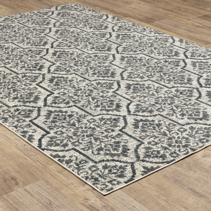 10' X 13' Ivory Blue And Sage Floral Power Loom Stain Resistant Area Rug