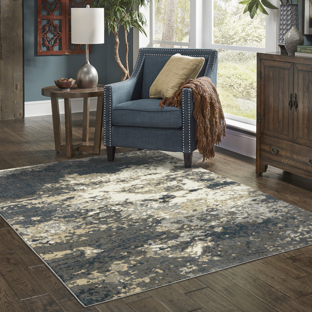 6' X 9' Beige Blue And Sage Abstract Power Loom Stain Resistant Area Rug