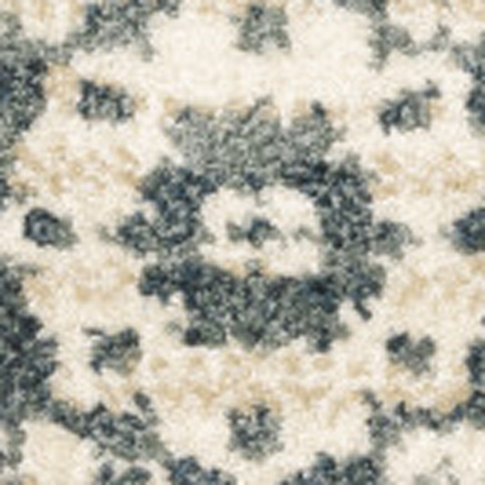 6' X 9' Beige Grey And Blue Oriental Power Loom Stain Resistant Area Rug