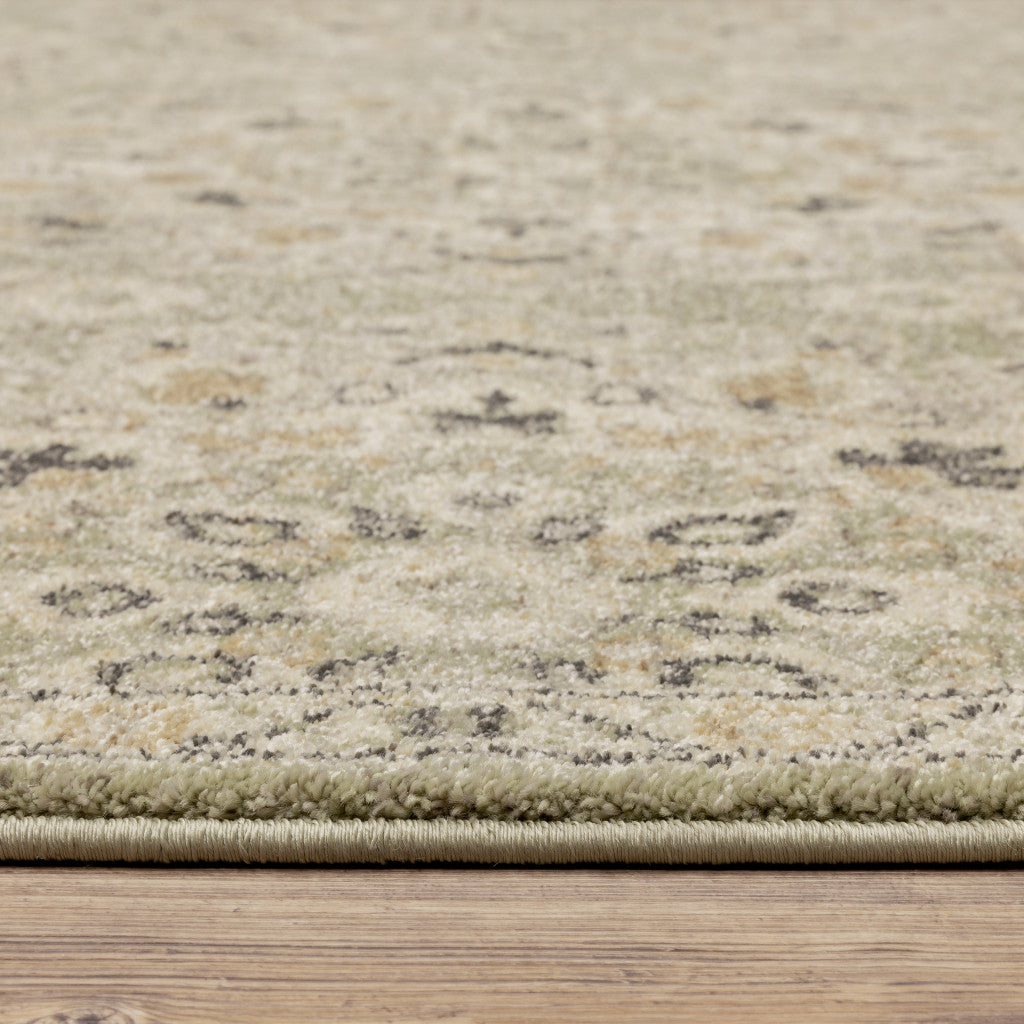 5' X 8' Green Ivory Grey And Tan Floral Power Loom Stain Resistant Area Rug