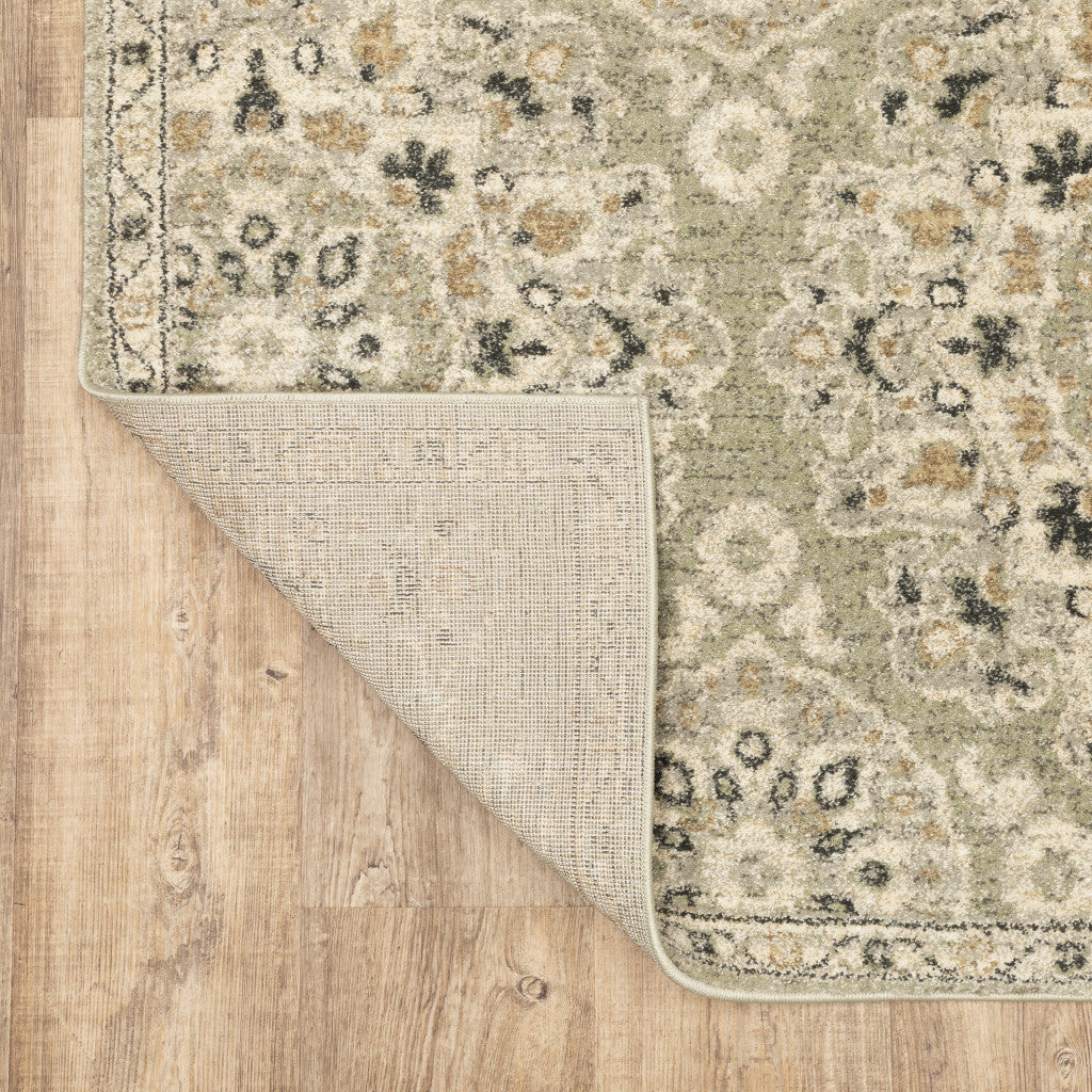 5' X 8' Green Ivory Grey And Tan Floral Power Loom Stain Resistant Area Rug