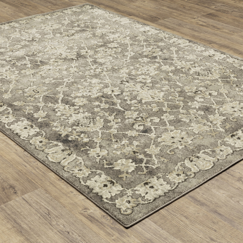 5' X 8' Grey Beige Tan And Brown Oriental Power Loom Stain Resistant Area Rug