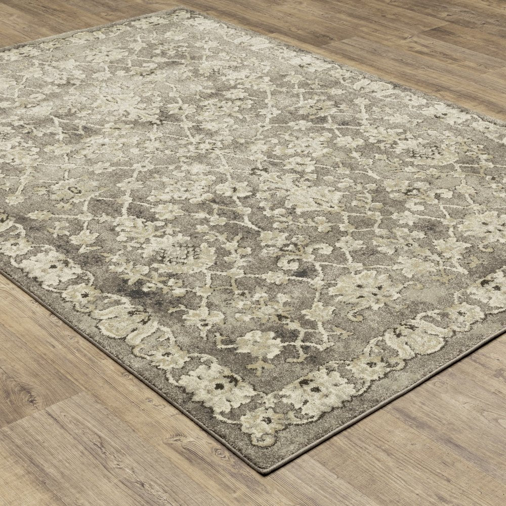 5' X 8' Gray And Beige Oriental Area Rug