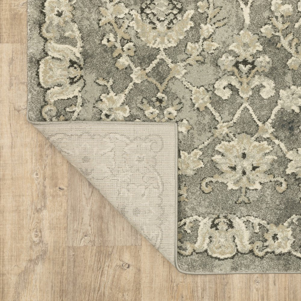 5' X 8' Gray And Beige Oriental Area Rug