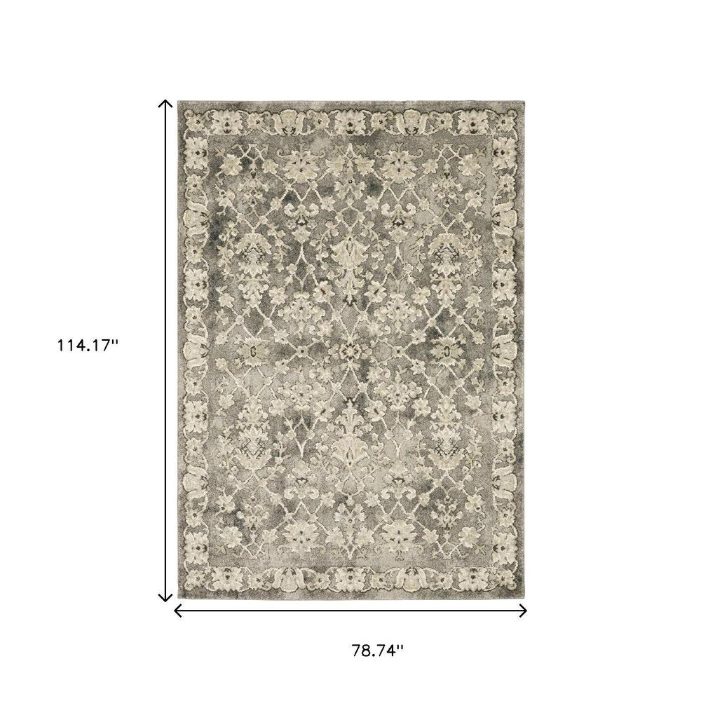 6' X 9' Grey Beige Tan And Brown Oriental Power Loom Stain Resistant Area Rug