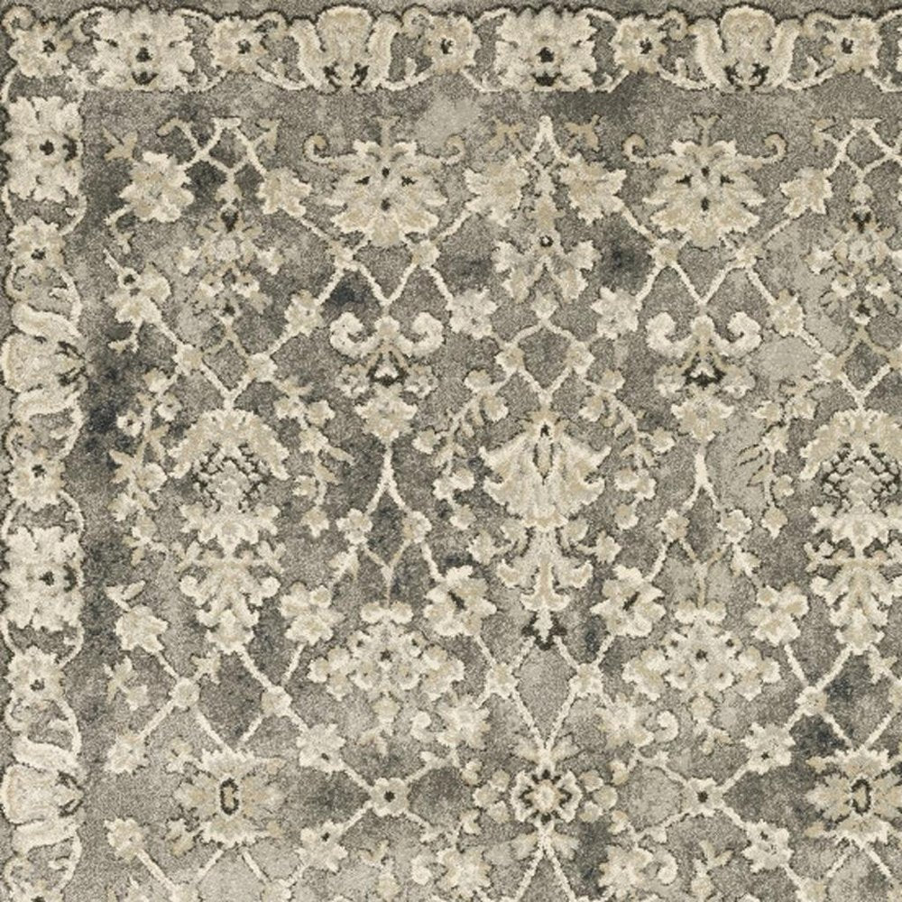 10' X 13' Grey Beige Tan And Brown Oriental Power Loom Stain Resistant Area Rug
