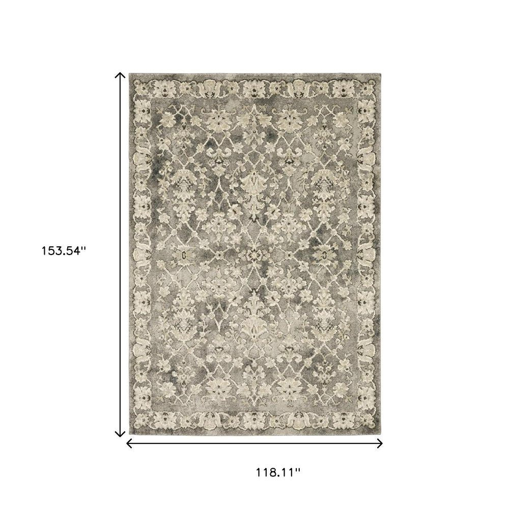 10' X 13' Grey Beige Tan And Brown Oriental Power Loom Stain Resistant Area Rug
