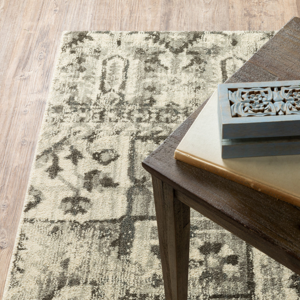 6' X 9' Grey Ivory And Brown Oriental Power Loom Stain Resistant Area Rug