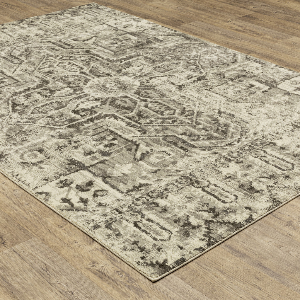 8' X 11' Grey Ivory And Brown Oriental Power Loom Stain Resistant Area Rug