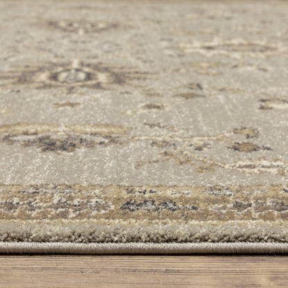 8' X 11' Grey Brown Tan And Beige Oriental Power Loom Stain Resistant Area Rug
