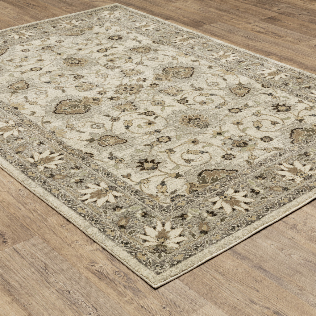 10' X 13' Beige Grey Brown And Charcoal Oriental Power Loom Stain Resistant Area Rug