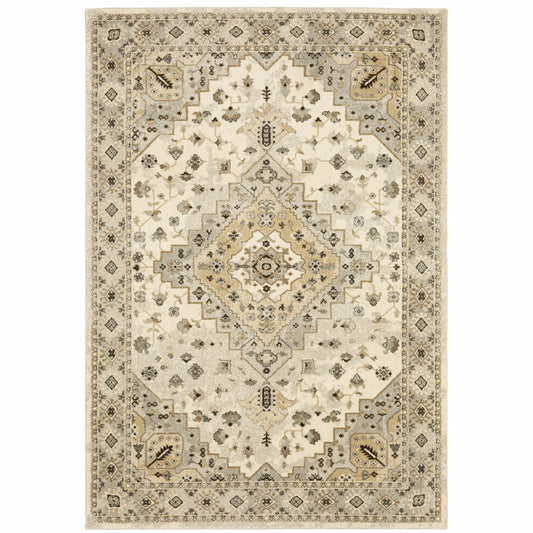 6' X 9' Beige Grey Tan And Brown Oriental Power Loom Stain Resistant Area Rug