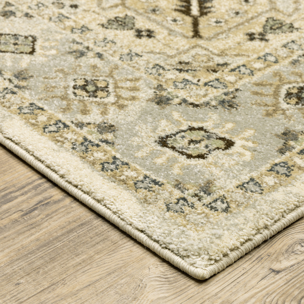 6' X 9' Beige Grey Tan And Brown Oriental Power Loom Stain Resistant Area Rug