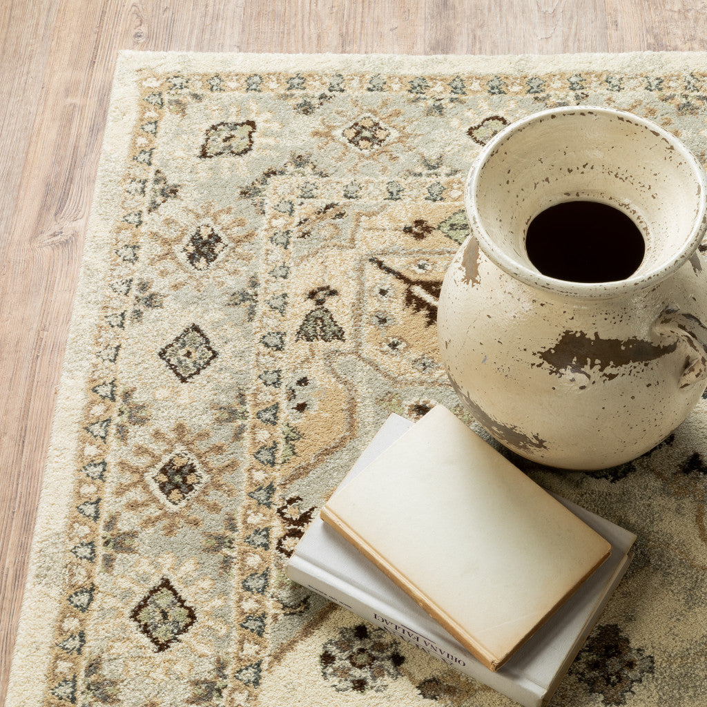 6' X 9' Beige Grey Tan And Brown Oriental Power Loom Stain Resistant Area Rug