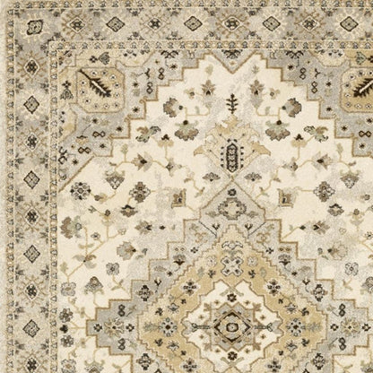 10' X 13' Beige Grey Tan And Brown Oriental Power Loom Stain Resistant Area Rug