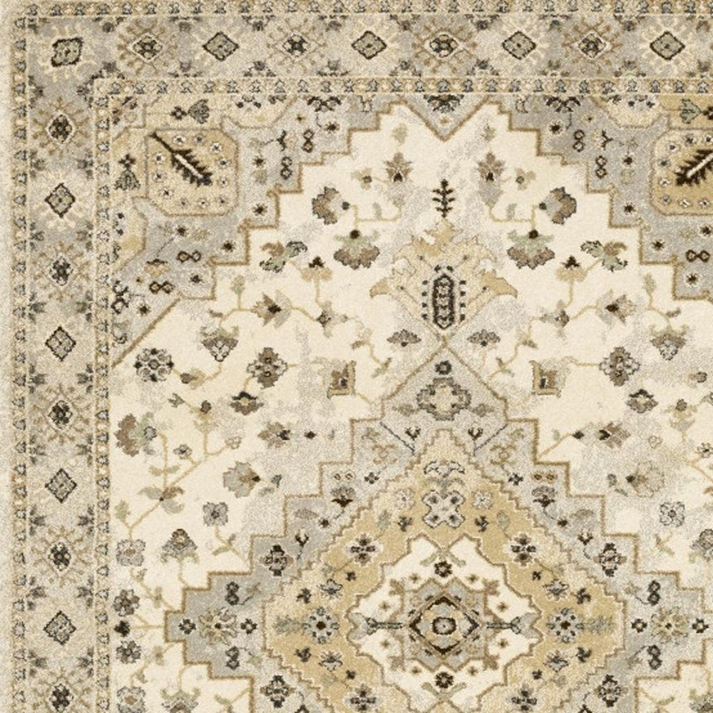 10' X 13' Beige Grey Tan And Brown Oriental Power Loom Stain Resistant Area Rug