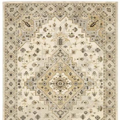 10' X 13' Beige Grey Tan And Brown Oriental Power Loom Stain Resistant Area Rug