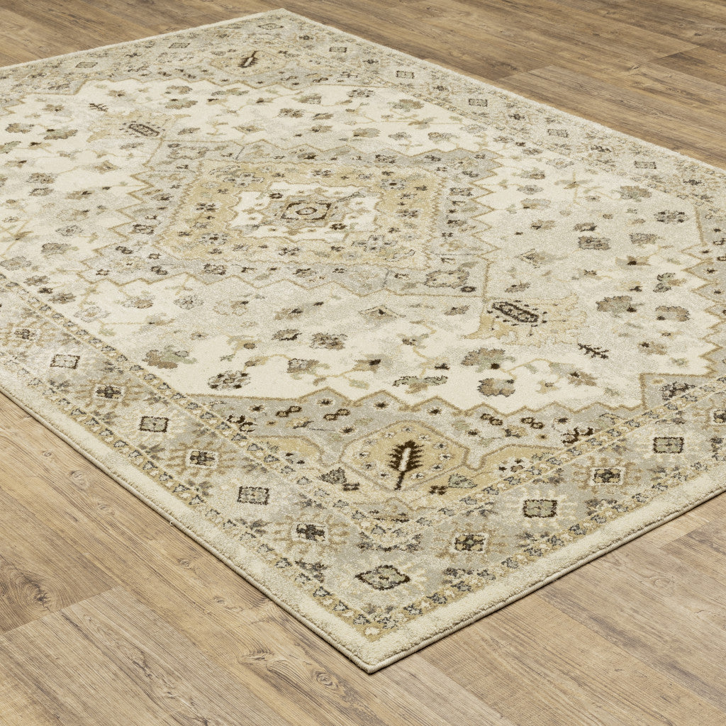 10' X 13' Beige Grey Tan And Brown Oriental Power Loom Stain Resistant Area Rug