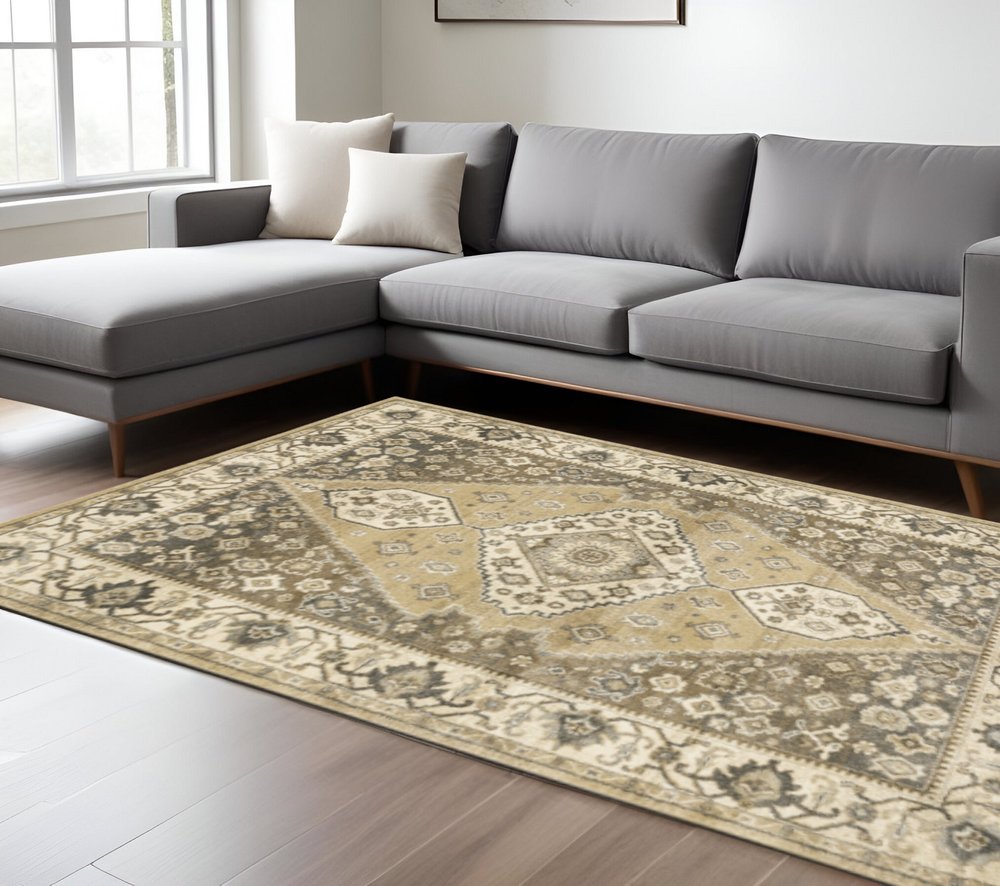6' X 9' Beige Grey Tan And Charcoal Oriental Power Loom Stain Resistant Area Rug