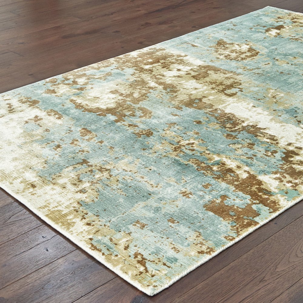 6' X 9' Blue And Brown Abstract Hand Loomed Distressed Area Rug