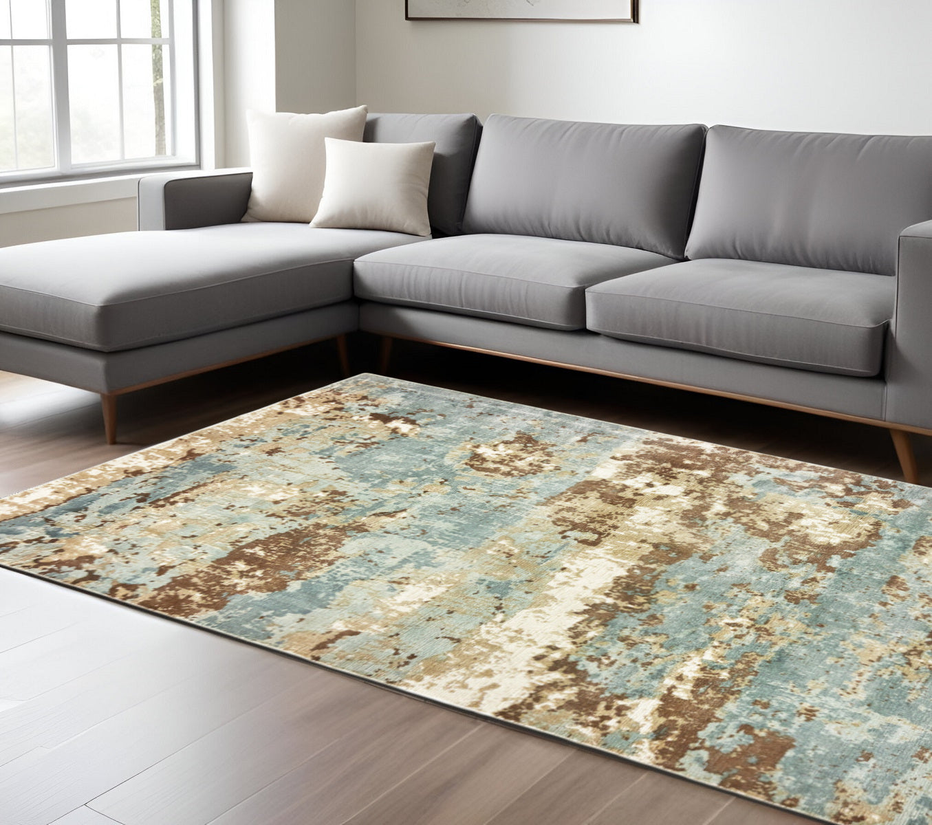 6' X 9' Blue and Ivory Abstract Hand Loomed Area Rug