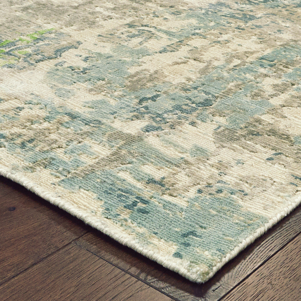 6' X 9' Blue And Green Abstract Hand Loomed Stain Resistant Area Rug